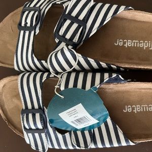 tidewater sandals. Never worn. Size 8 blue white stripped.